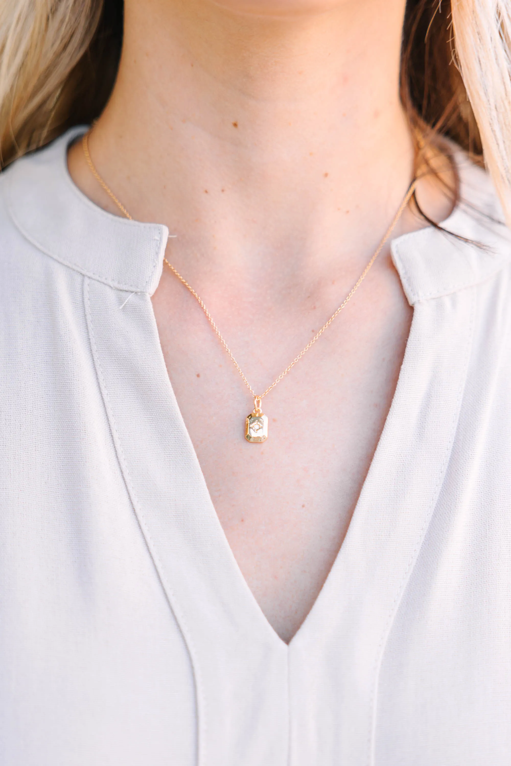 Feeling Accomplished Gold Starburst Pendant Necklace