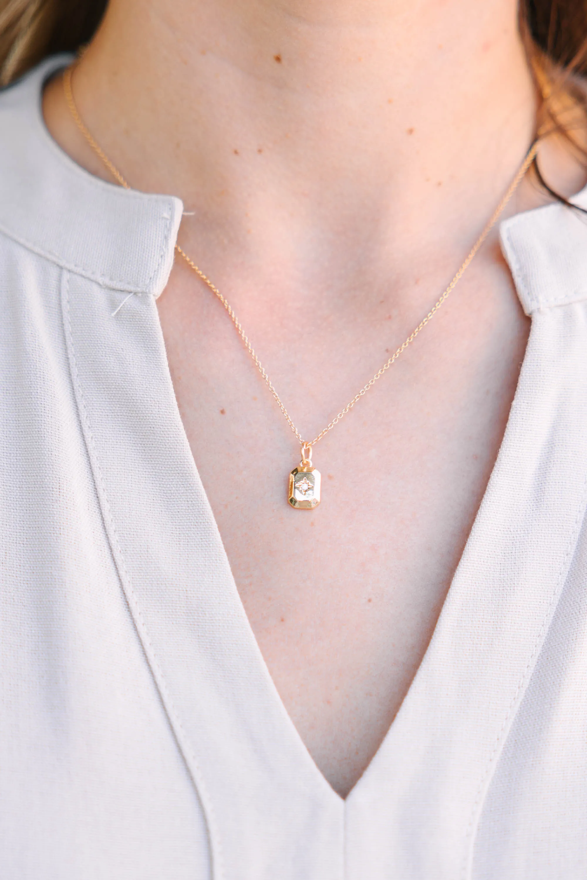 Feeling Accomplished Gold Starburst Pendant Necklace