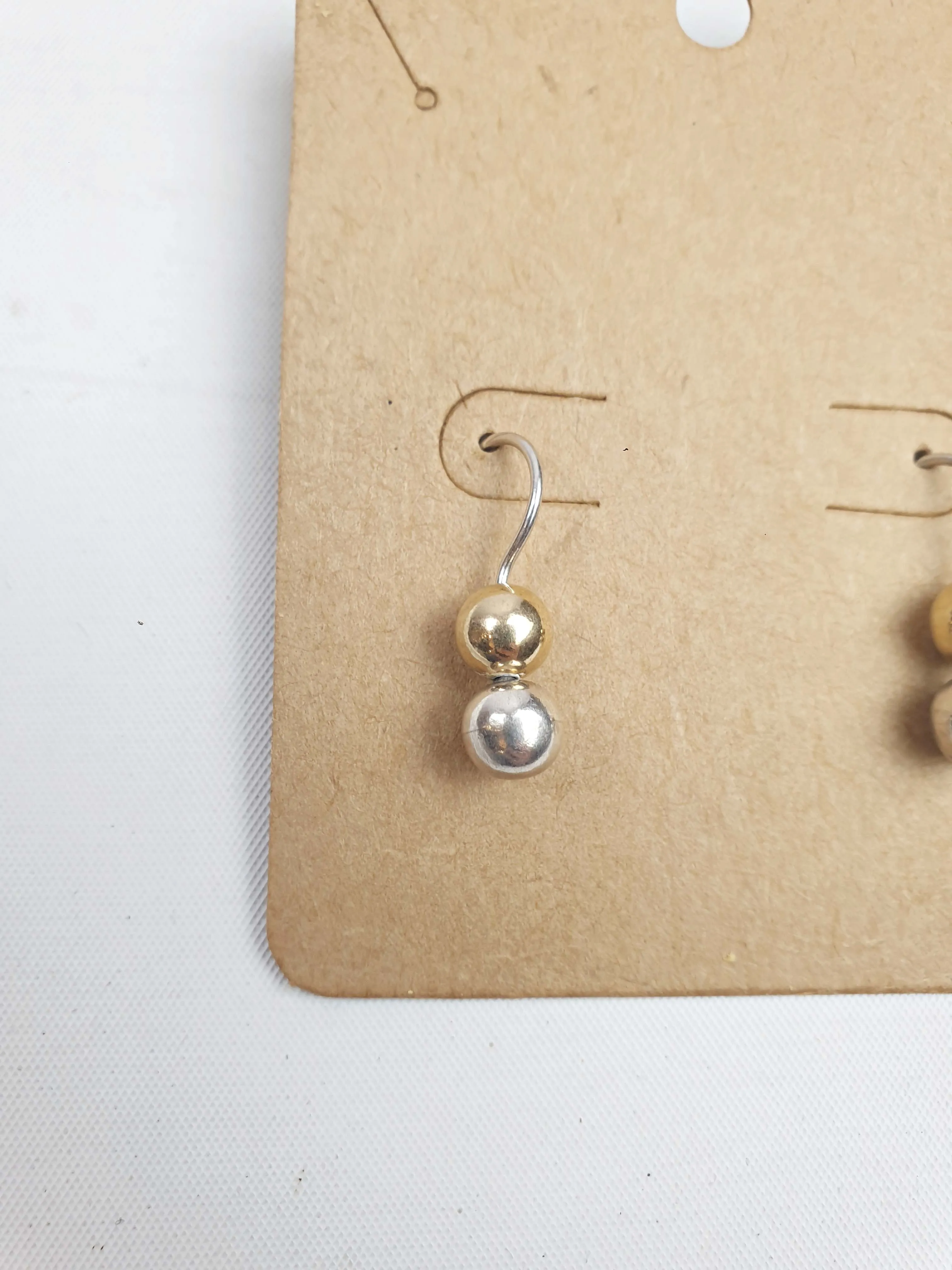 Silver and gold E26 drop earrings