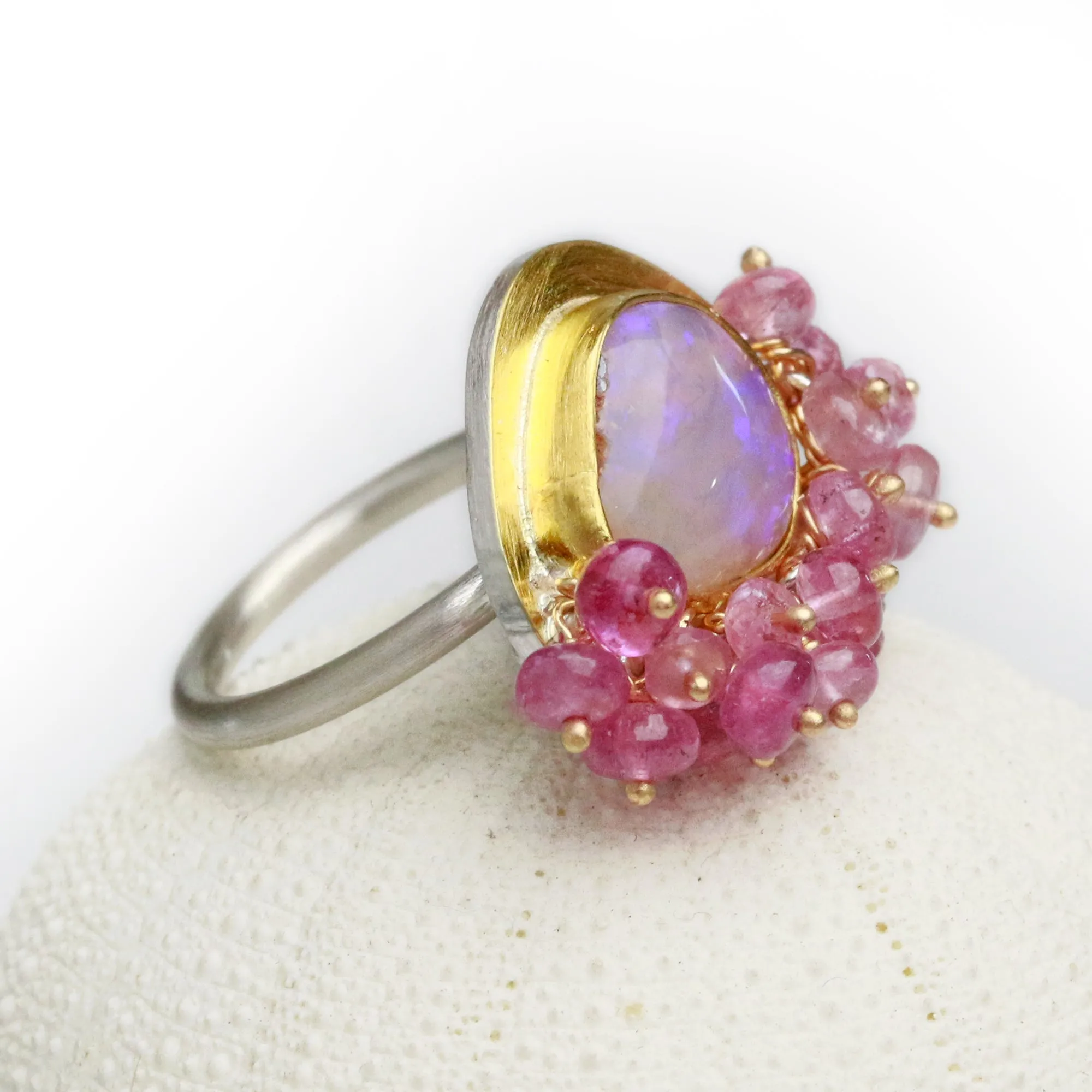 Sold Dusty Rose and UV Flash Boulder Opal with Pink Sapphire Fringe. Size 6 1/2.