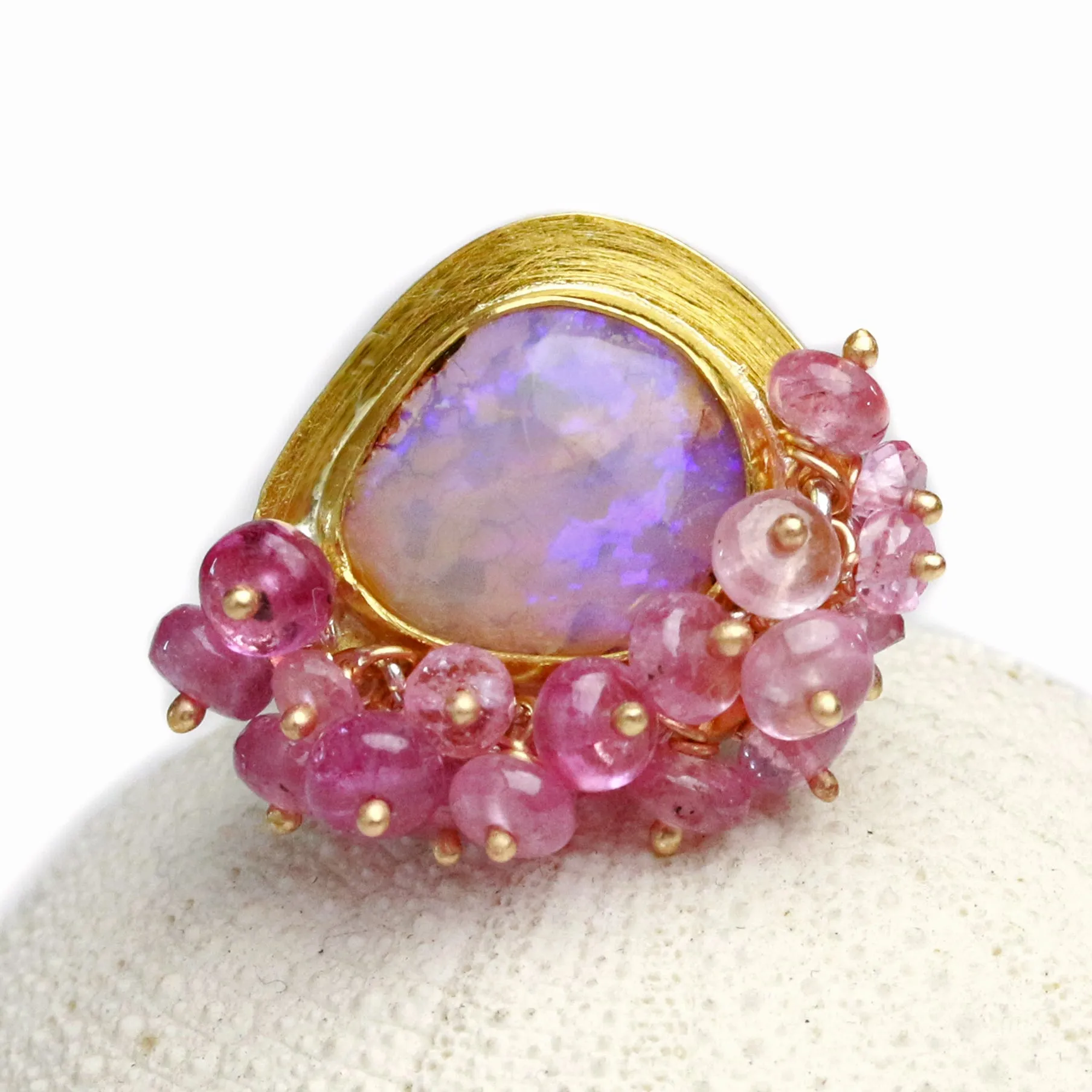 Sold Dusty Rose and UV Flash Boulder Opal with Pink Sapphire Fringe. Size 6 1/2.