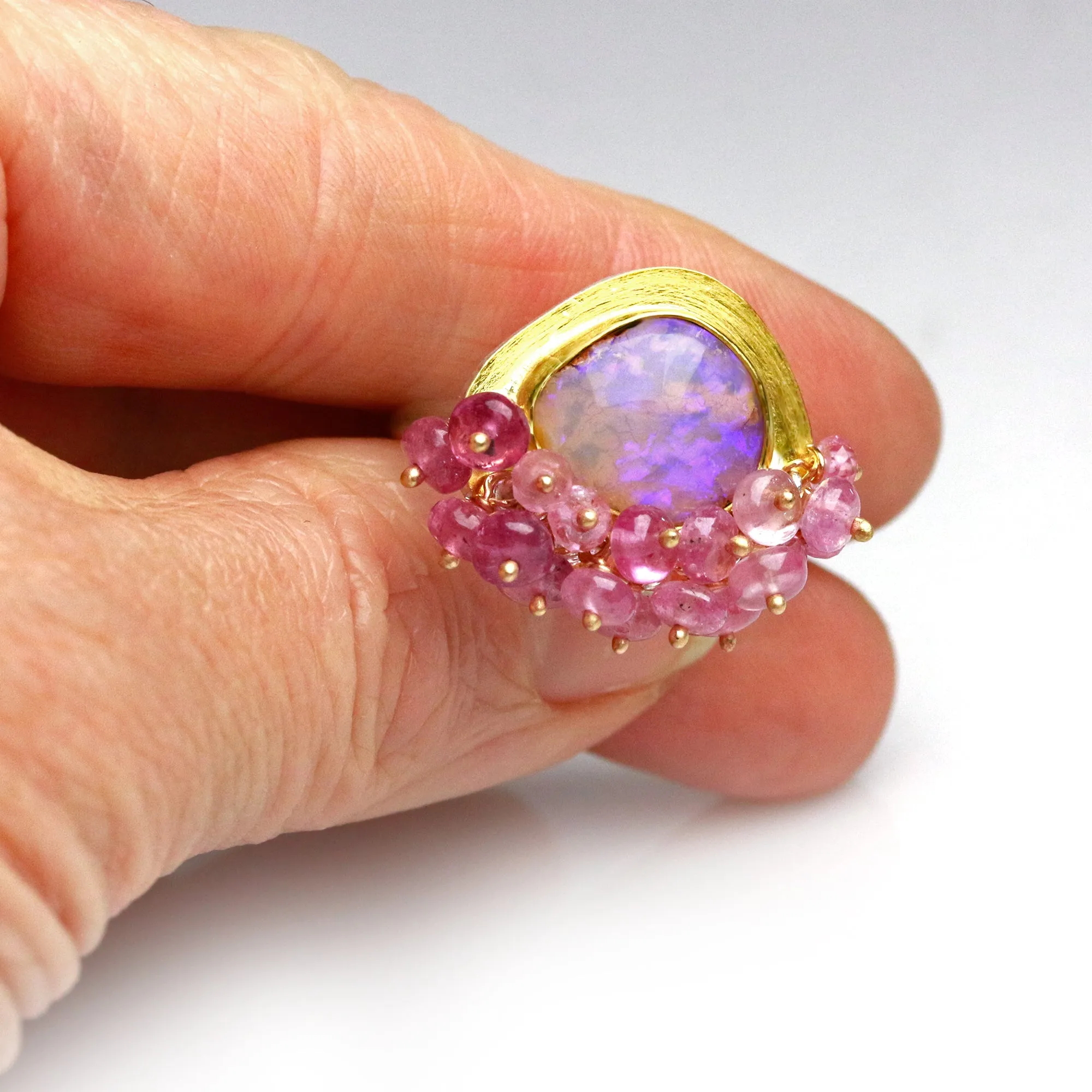 Sold Dusty Rose and UV Flash Boulder Opal with Pink Sapphire Fringe. Size 6 1/2.